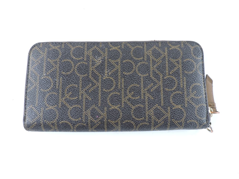 Police Auctions Canada - Women's Calvin Klein Monogram Ziparound Long Wallet  (514799L)