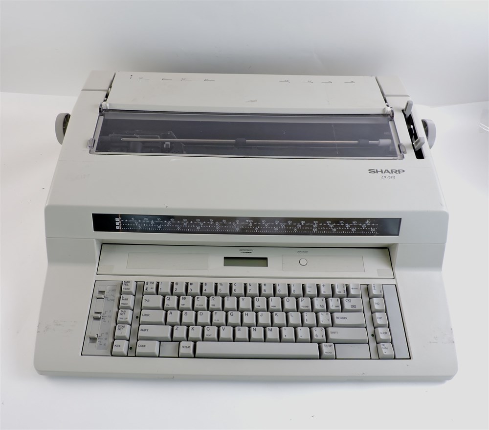 Police Auctions Canada - Sharp ZX-370 Vintage Electric Typewriter 